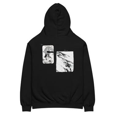 Back view of an oversized hoodie in black. A large two-panel composition fills the back. On the left, a halftoned portrait with a solid black bar across the eyes; to the right, a wider panel of sweeping feathers in heavy contrast. The words "pas" and "d'aveu" float above them in a fine serif, the letters spaced apart and drifting.