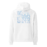 Back view of an oversized hoodie in white. A large square collage in pale sky blue layers oversized fragmented lettering over clouds, handwritten script and geometric diagram lines. Numbered index strips read 'Total Unity', 'Genius-Villain Paradox' and 'Chain of Genesis', with smaller labels for 'experiment log' and 'tech status: unstable'. A thin border frames the panel, with the name set vertically down the left edge.
