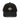 Front view of a corduroy cap in Black. A circular emblem is embroidered on the front panel: a plain gold ring, with a white winged spearhead stitched through its centre and swept wings running out to either side. Unstructured six-panel corduroy crown, curved brim, metal buckle.