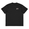 Front view of a box tee in black, flat. A small chest graphic of stylised question marks, the middle one in red.
