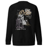 Back view of a solid-colored sweatshirt. A large, vertical collage graphic on the upper back features large, ornate gothic letters 'G' and 'S', layered with high-contrast floral illustrations and fine-line architectural schematics. The design also includes various blocks of English and East Asian text.