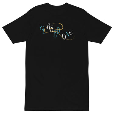 Front view of a solid-colored shirt. A graphic on the chest features the letters spelling "CURSED ONE" scattered and layered in a mix of high-contrast fonts, intertwined with a fine swirling line.