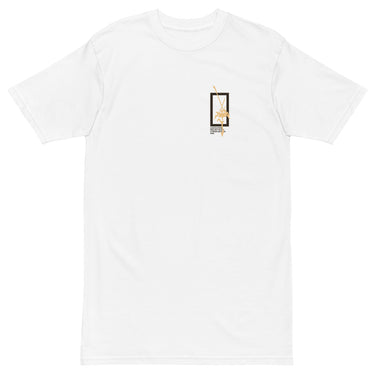Front view of a solid-colored shirt. A small graphic on the chest features a vertical rectangular frame containing a high-contrast floral illustration and a sword-like shape.